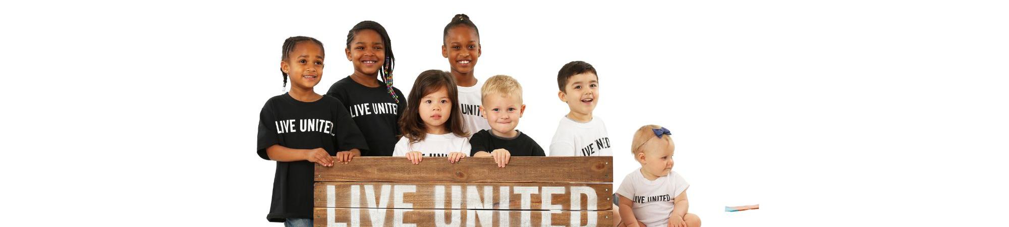 Children in LIVE UNITED shirts