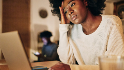 Women staring at computer screen